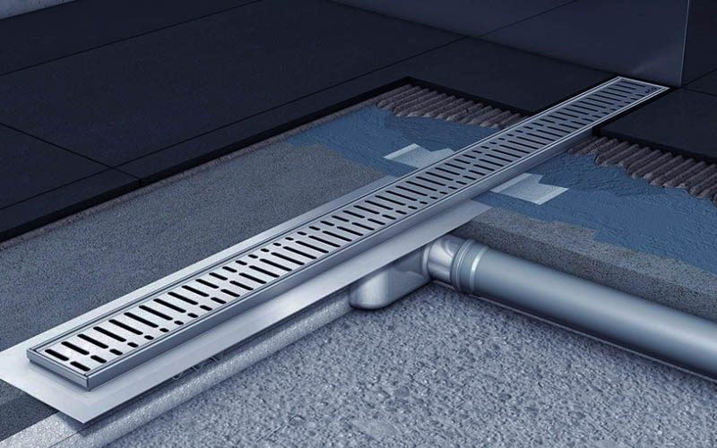 Сучасні технології у ванній: переваги та стиль зливного трапу для душу