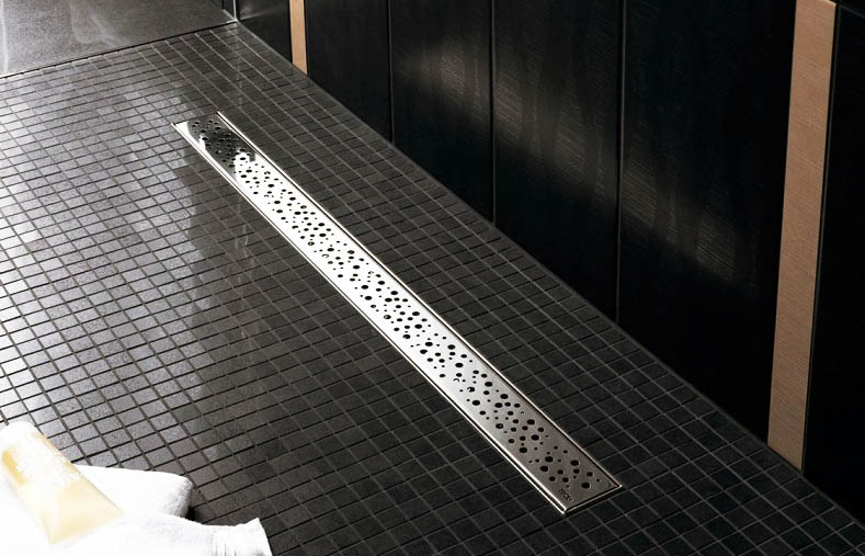Нержавіюча сталь у душі, як інноваційні трапи забезпечують ідеальний стік води та захист від запахів