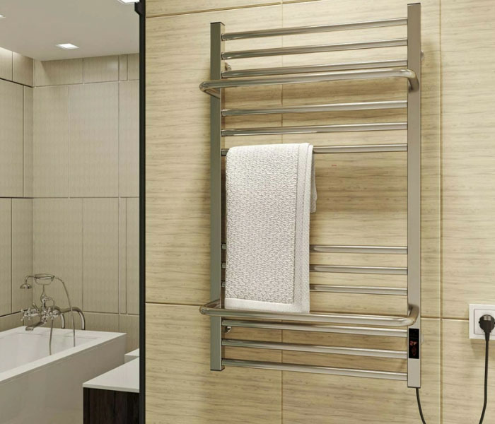 Елегантність та ефективність, переваги електричної рушникосушарки з полицею